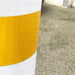 High Intensity Yellow Reflective Tape Stuck to a Post